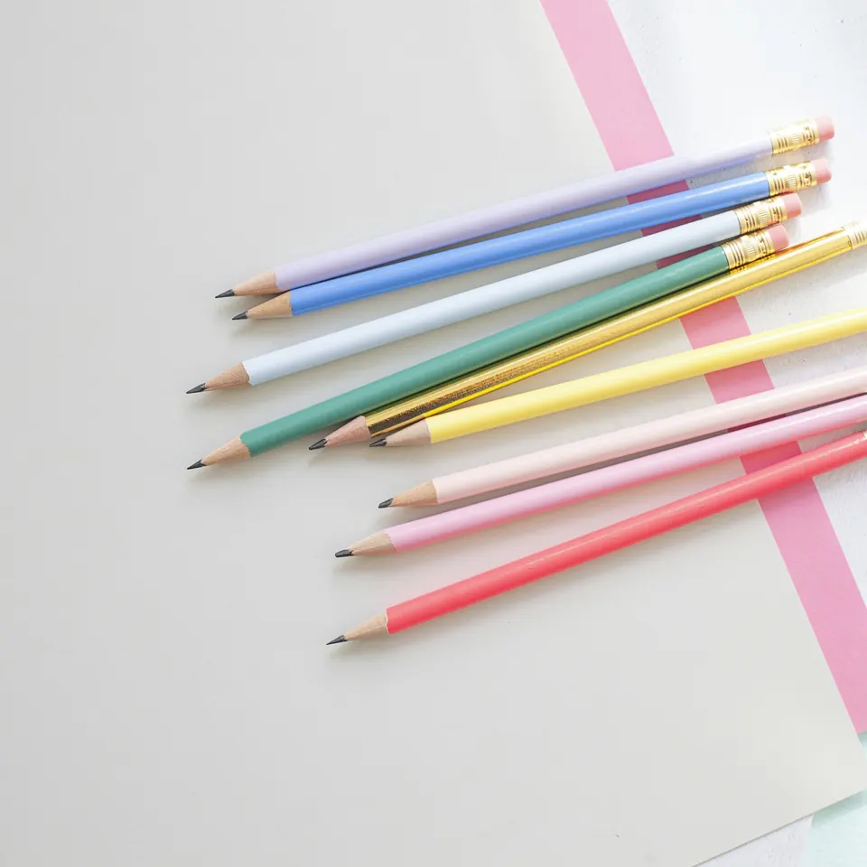 Colour pencils spread across a table