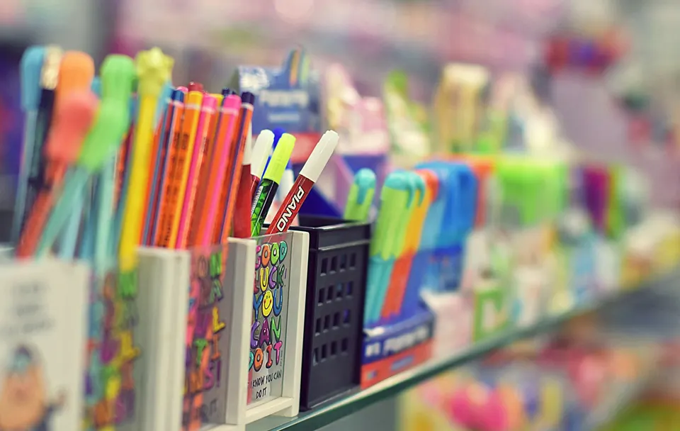 Rows of coloured pens in a shop display